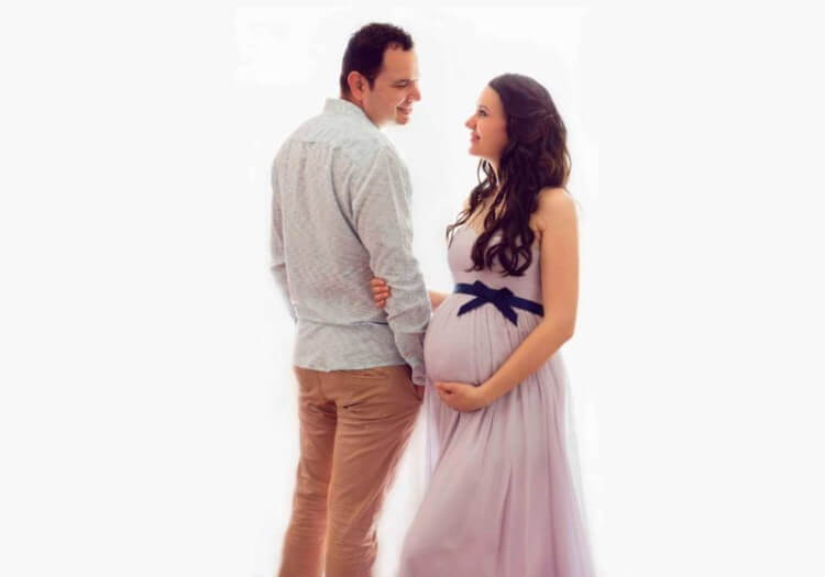 happy couple at a pregnancy and maternity photo session