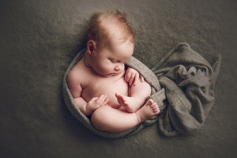 Brisbane-newborn-photographer-Baby-on-the-back-pose-by-Lifetime-Stories-Photography