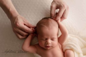 Newborn photography by Lifetime Stories Photography on the beanbag