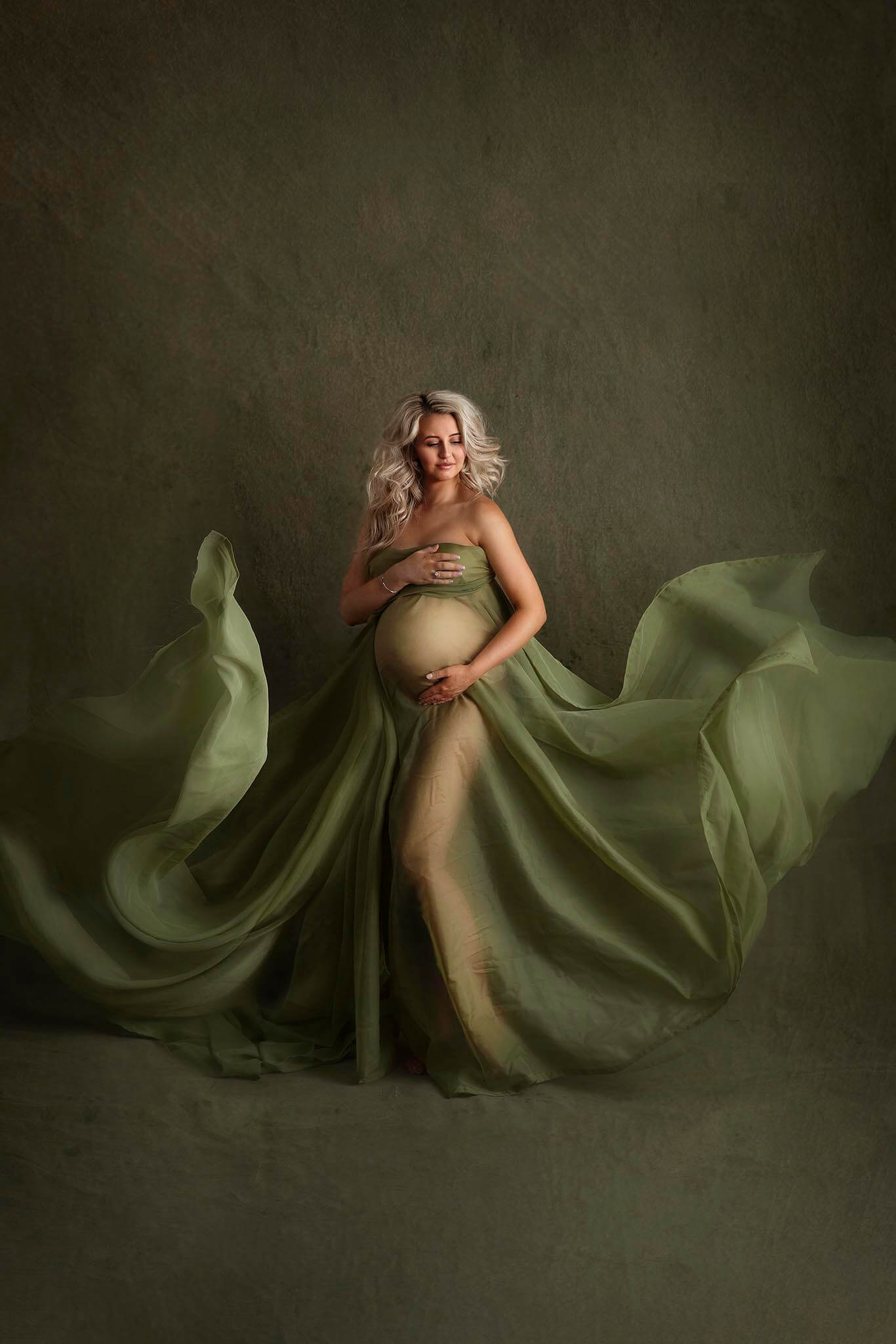 Pregnant mama in green dress